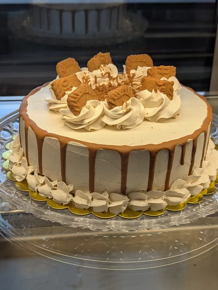 Cookie butter layer cake with a caramel drip